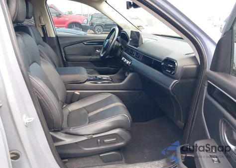 2023 Honda Pilot 2Wd Touring z USA, uszkodzony, nr VIN 5FNYG2H7XPB014642